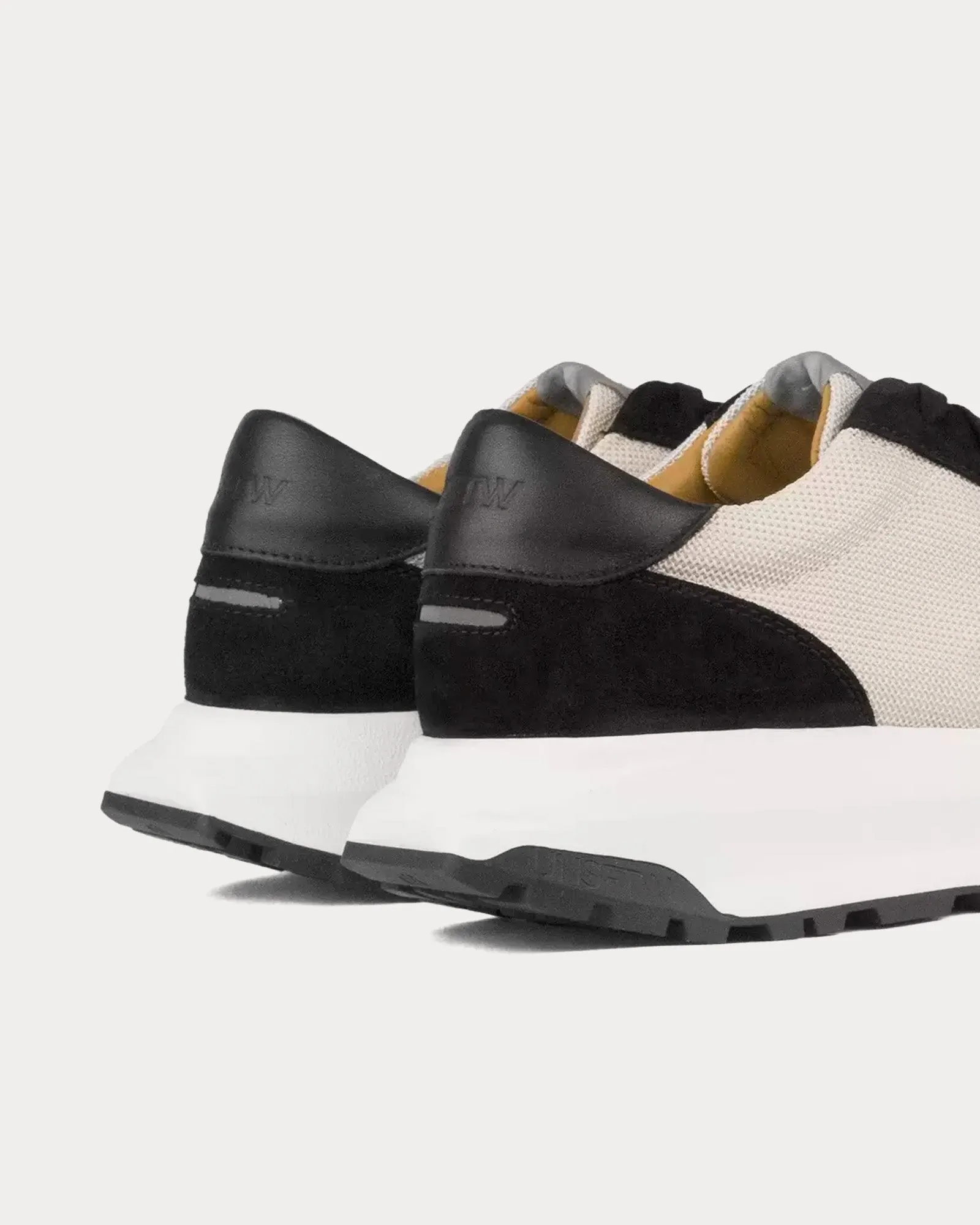 Trinity Luxe Suede Black / White Low Top Sneakers